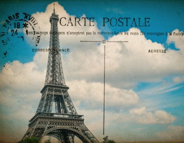 empty antique french postcard  from paris with eiffel tower and blue sky. vintage sentimental retro style paper background