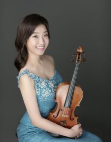 Portrait of Violin I musician and Associate Concertmaster Minji Kim