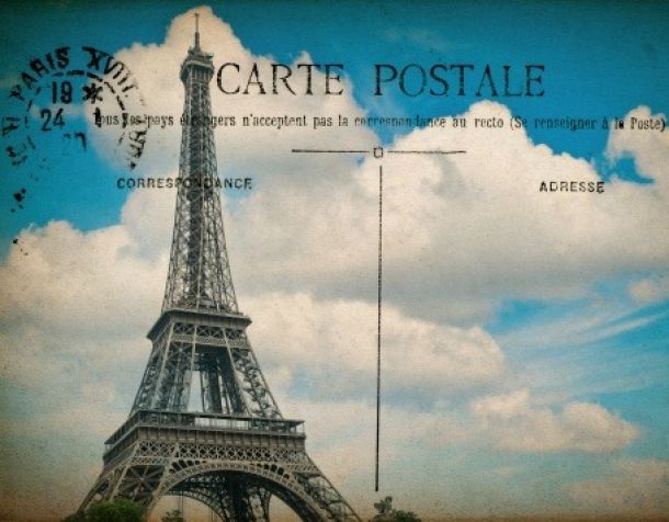 empty antique french postcard  from paris with eiffel tower and blue sky. vintage sentimental retro style paper background