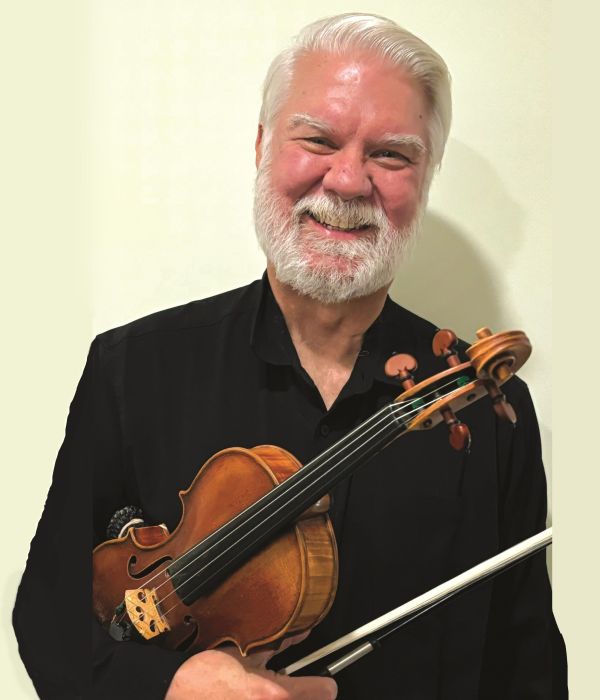 Portrait of Violin I musician and Concertmaster Davis Brooks