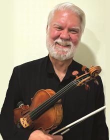 Portrait of Violin I musician and Concertmaster Davis Brooks