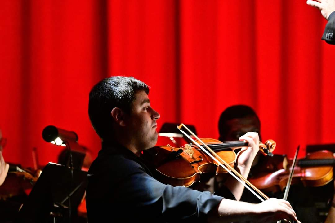 Portrait of ​​Violin I musician Lev Roshal