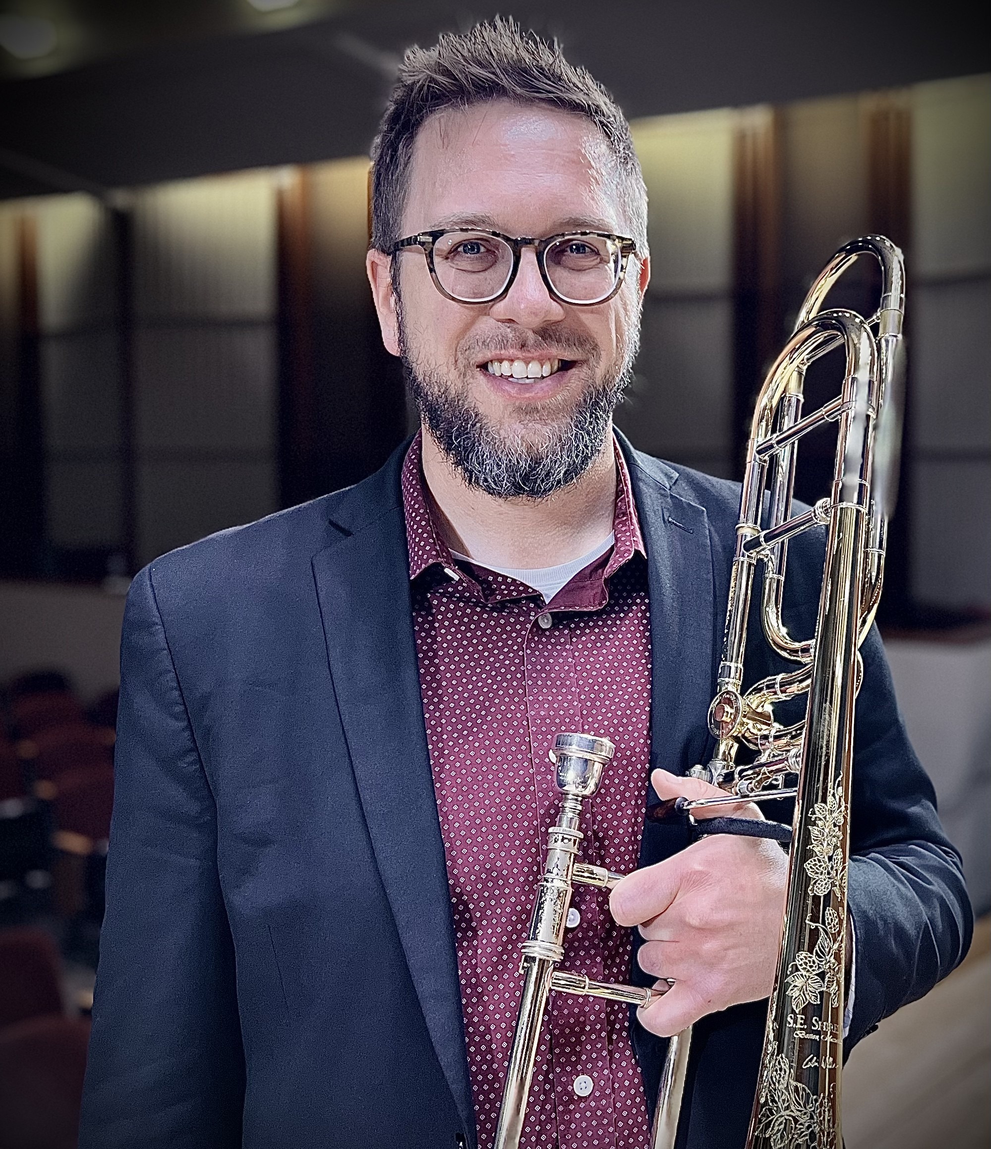 Portrait of Principal ​Trombone musician Chris Van Hof