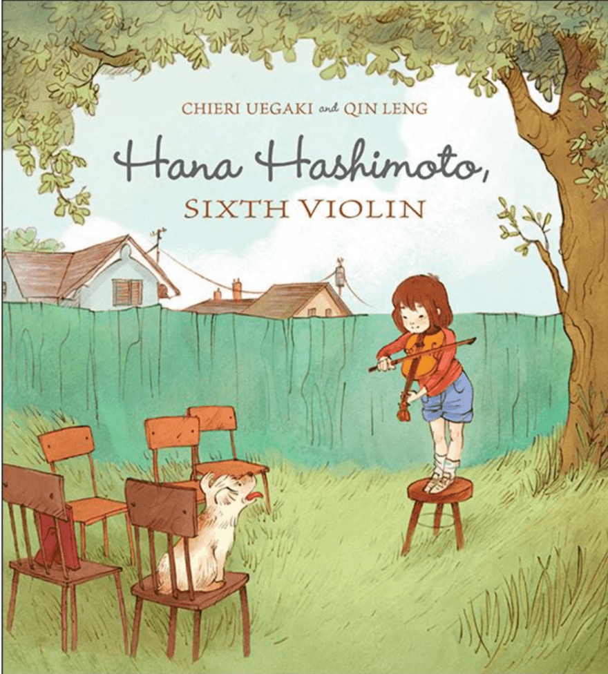 Children's book cover for Hana Hashimoto by Chieri Uegaki and Qin Leng. It depicts a small girl outside standing under a tree on a chair playing the violin while her puppy sits on a chair watching