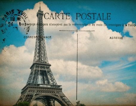 empty antique french postcard from paris with eiffel tower and blue sky. vintage sentimental retro style paper background