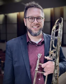 Portrait of Principal ​Trombone musician Chris Van Hof