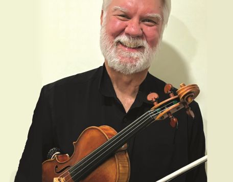 Portrait of Violin I musician and Concertmaster Davis Brooks